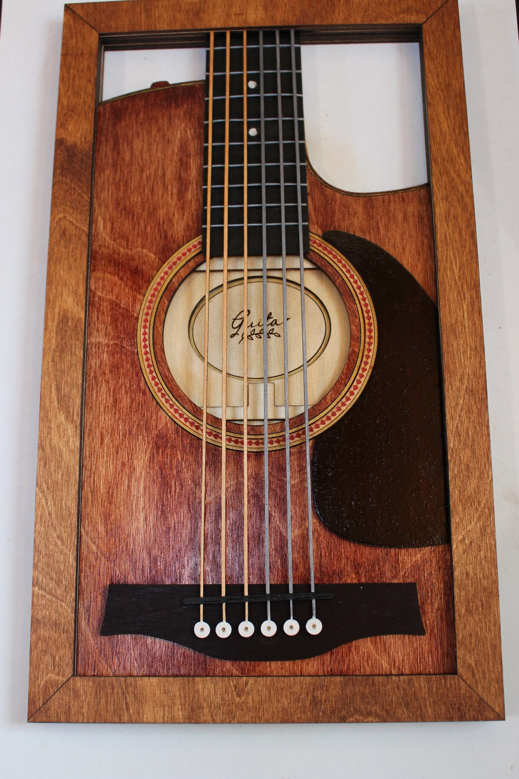 Framed laser-cut Guitar